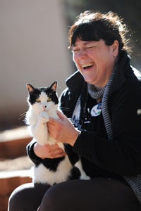 Bob the legendary black-and-white cat and his new mom Monica