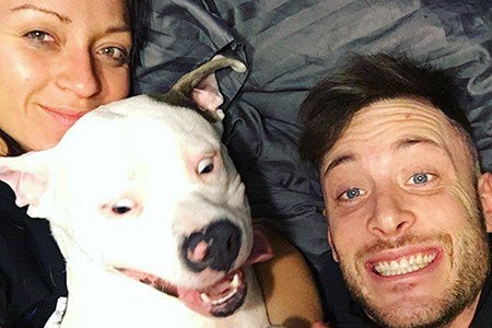 Diggy the pit bull and his family are still smiling