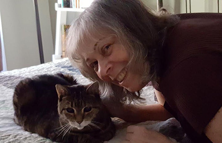 Volunteer Arlene Dolinko with a cat