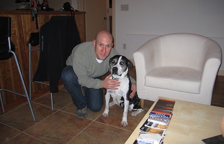 Volunteer Howard Haber with Magnolia the dog
