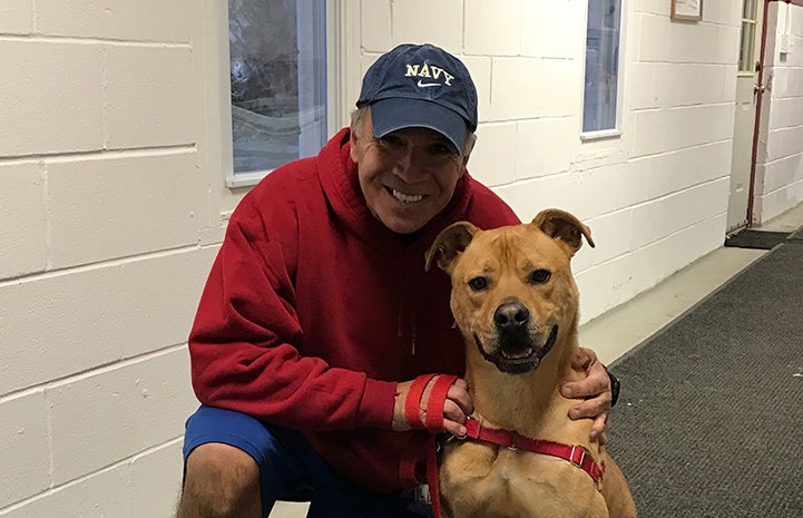 Volunteer Peter Vega with Tyler the dog