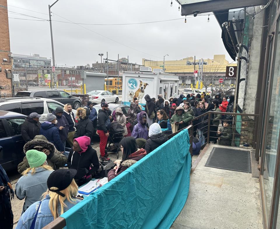 People waiting in line waiting to attend the adoption event in Brooklyn