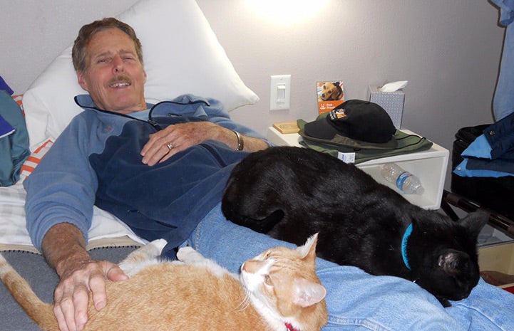 George Folz with some sleepover cats