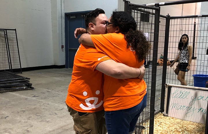 After the proposal at the Houston Super Adoption, Eddie Macias with Arianna Tijerina hugged