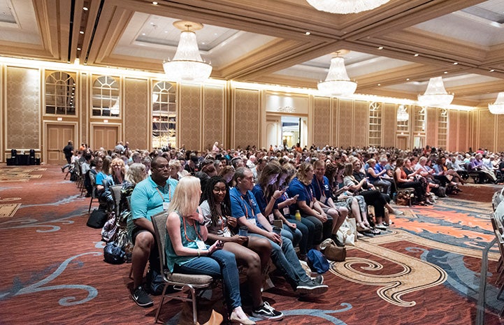 Group of people sitting in the audience at the Best Friends National Conference