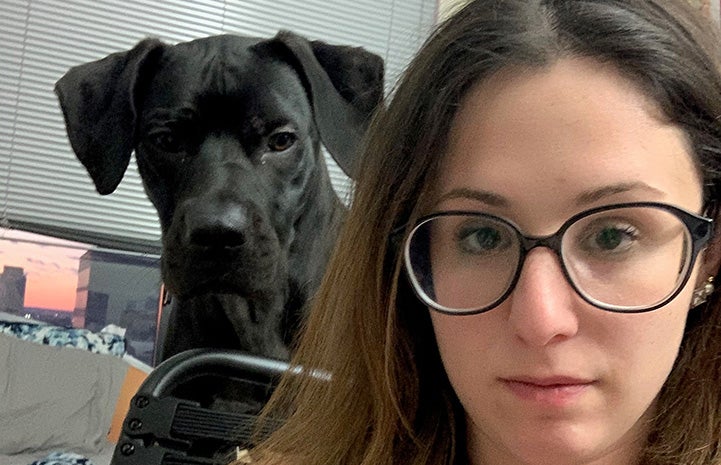 Selfie of Rachel with Milo the dog