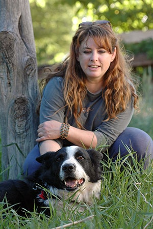 Sullivan Bear Dog, who looks black and white like a border collie but actually a Karelian bear dog, with Liz Finch