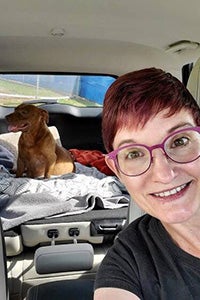 Kim driving Frannie the pregnant dog from Houston to Utah