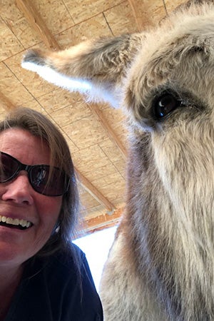 Selfie of Lauri and Speedy the donkey