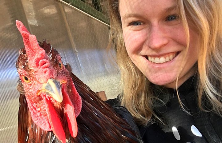 Brianna the caregiver with Thor the rooster