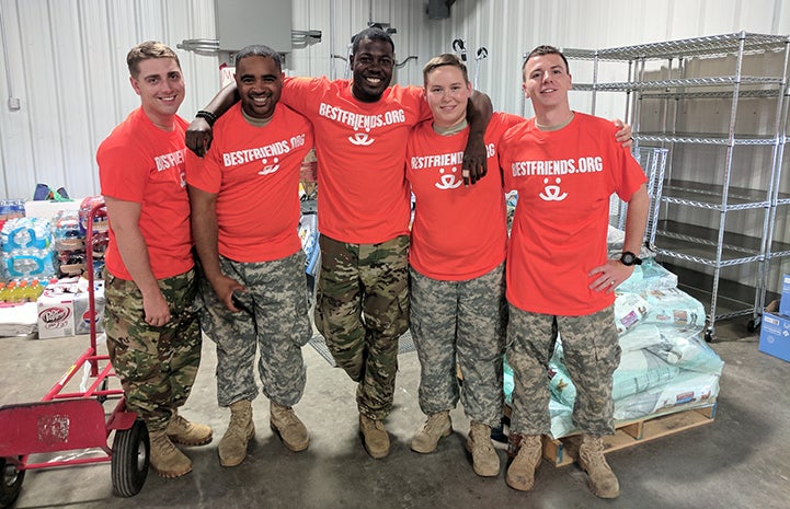 Military folks helping animals after Hurricane Harvey