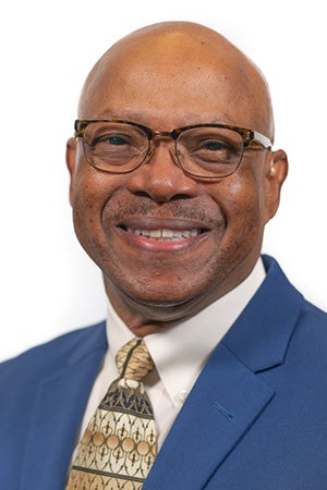 Head shot of Dr. Michael J. Blackwell, DVM wearing a suit and tie