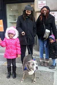 The Reeves family adopting Bertha the pit bull terrier