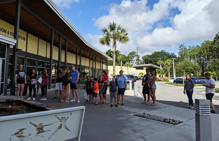 People standing in line waiting to foster for the Jacksonville Humane Society before Hurricane Dorian