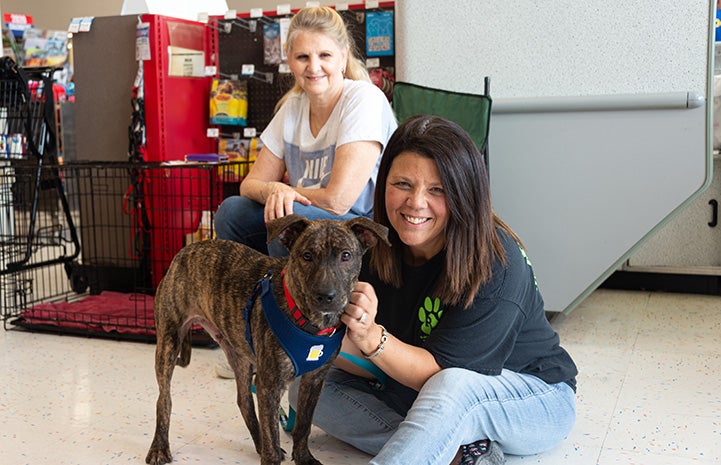 Two women with a dog from Rockwall Pets