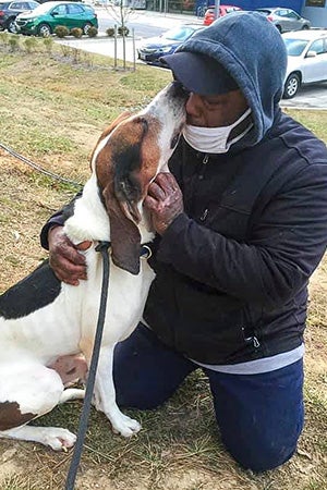 Barak the dog being reunited with his person