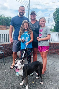 The Estle family with Roxy the dog