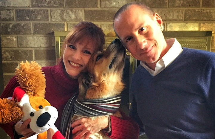 Matt Lallo and Paula Sessa with Lego the dog and a plush stuffed animal