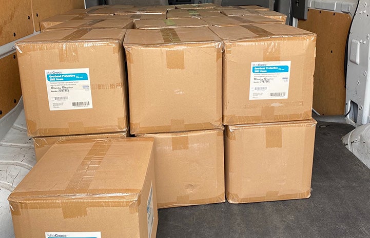 Boxed up medical protective gowns to be donated