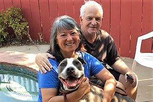 Rocco the dog being adopted