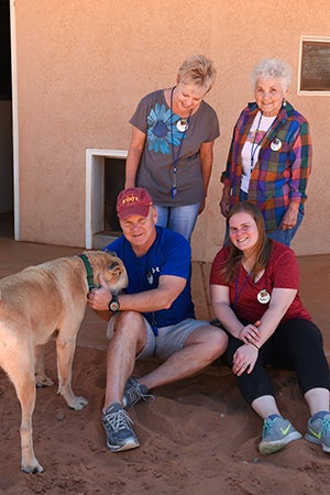 Katie Kramer Kelley with her family volunteering at Best Friends Animal Sanctuary