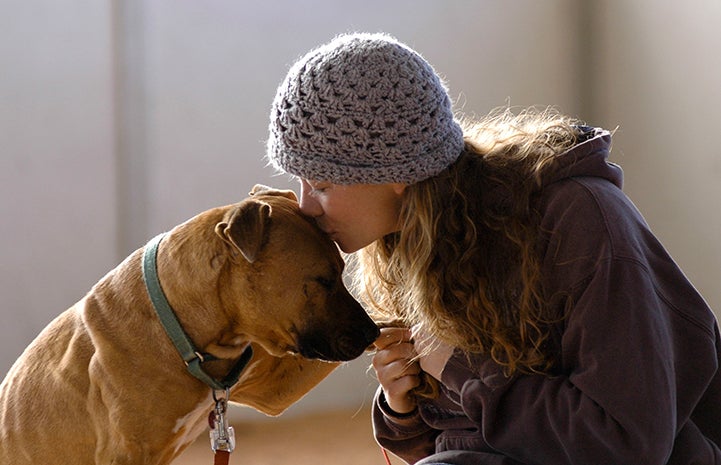 Caregiver Carissa Hendrick with Vicktory dog Oscar
