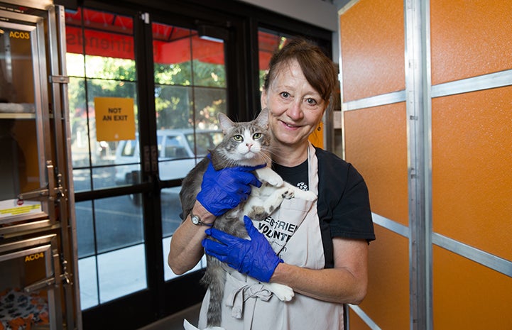 Kim Bayley believes the most gratifying thing about volunteering at the pet adoption center helping the staff concentrate on their jobs and the mission