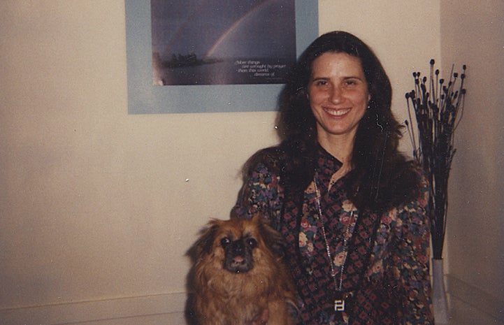 Historical image of Jana DePyer with a dog
