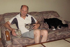 Brad with his three FIV-positive cats