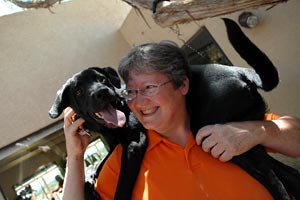 Dog trainer Karen with a search and rescue canine candidate dog