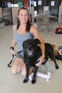 Jude the dog with his caregiver Liz