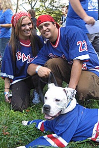 New York Rangers fans with a dog
