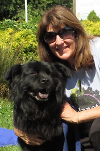 Mary Ann Smith with Charlie the chow mix