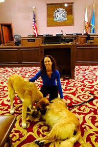 Elizabeth Oreck who helped get the pet sale ban passed with two dogs at Beverly Hills City Council