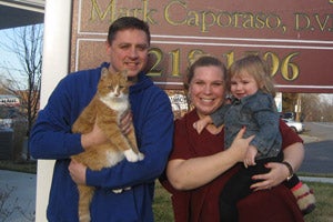 Skippy the cat was adopted at National Cat Caretakers Day. Here, he is pictured with his adoptive family.