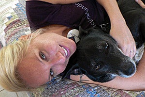 Sharon Discorfano on a sleepover with Harpo the dog