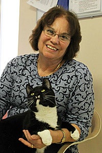 Volunteer Linda Schiele with Braveheart the cat at Best Friends Animal Sanctuary
