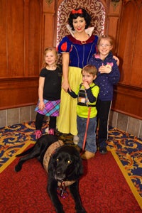 Kids with dog meeting Snow White
