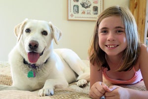 Mama Stormy the Labrador mix, now Chessa, has learned that people are her friends