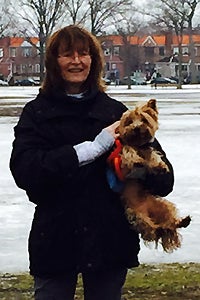 Taz the rescued silky terrier dog and his adopter Margaret