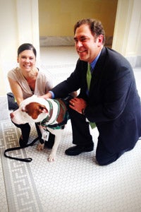Representative Brian King, Captain Cowpants the pit bull terrier dog, and Melissa Lipani