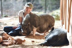 Kat Lucas from Hamburg, Germany, and Cherry the pig