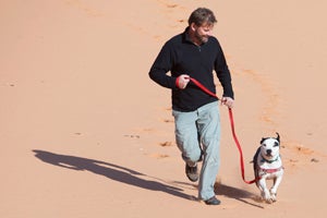 David and Kiwi the dog at Coral Pink Sand Dunes State Park