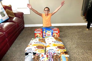 Preteen Danica's birthday pet food and treat donation for the dogs at Best Friends ANimal Sanctuary