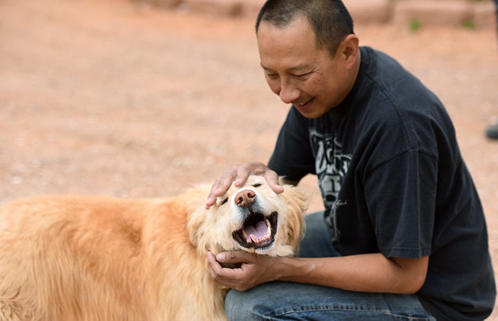 Dogtown caregivers started from the ground up to earn Bodin the dog’s trust and to form a bond with the golden retriever mix