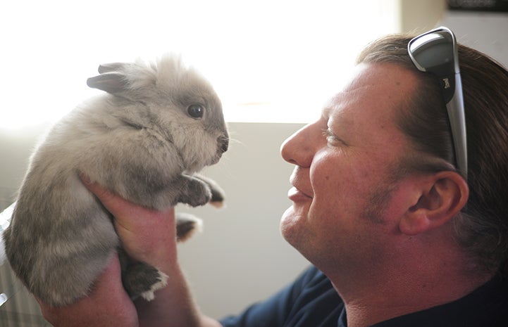 Jason Dickman with Meriwether the rabbit