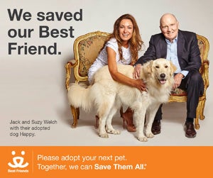 Jack and Suzy Welch with their adopted dog Happy