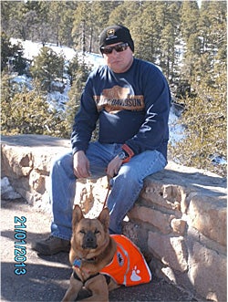 Ted Martello, a disabled veteran, with his Canines With Careers dog