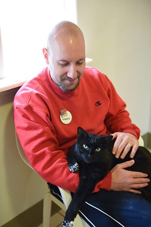 Howard Haber volunteering at Cat World