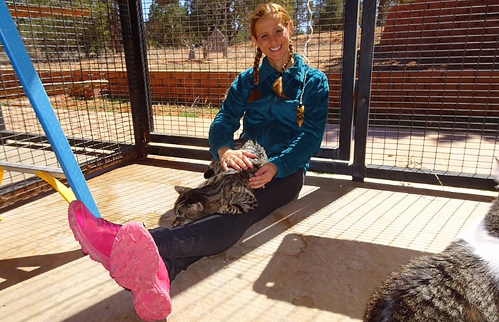 Edina Ivens enjoying her volunteer vacation at Cat World at Best Friends Animal Sanctuary